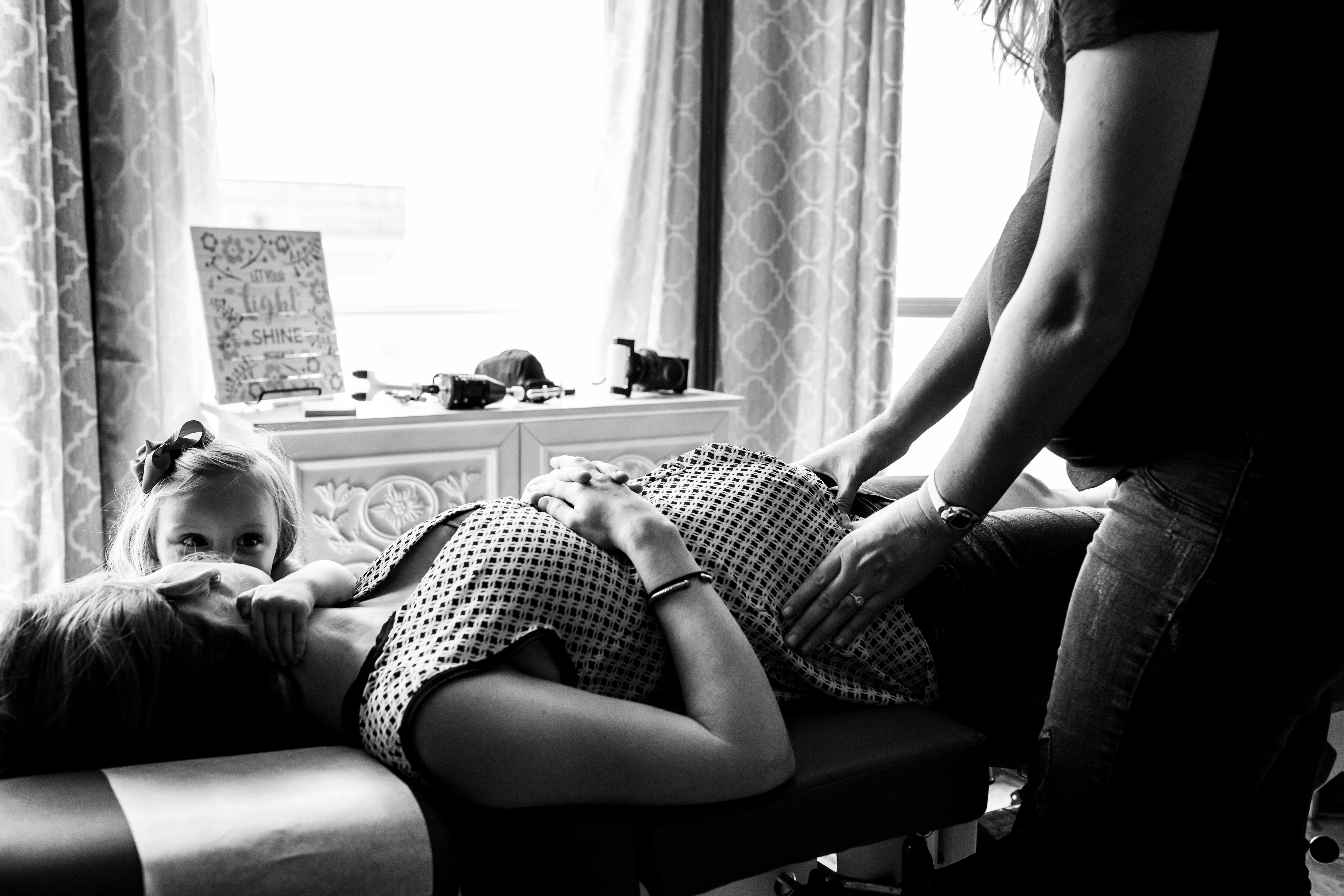 Pregnant Mom getting Chiropractic Adjustment