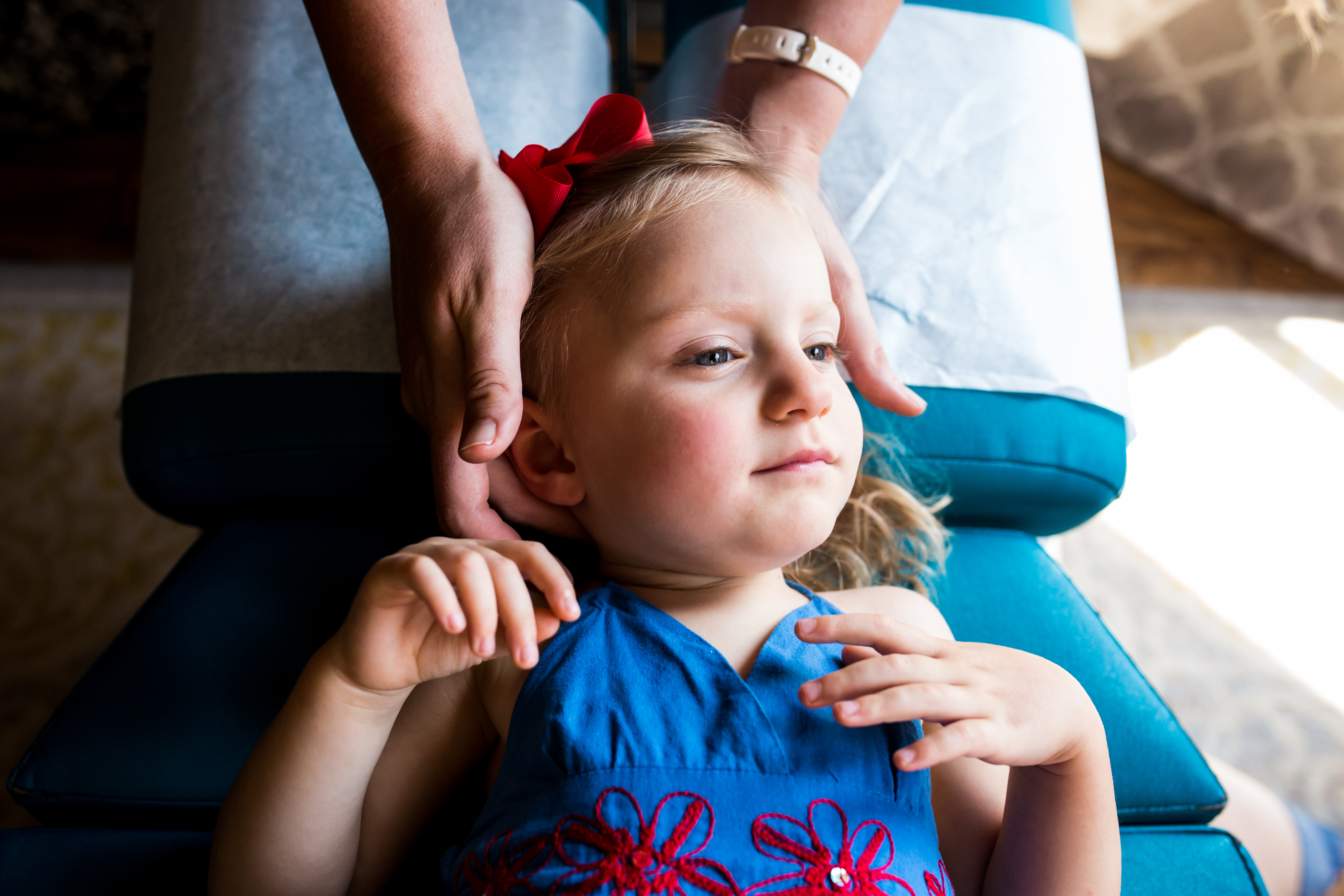 little girl getting a chiropractic adjustment