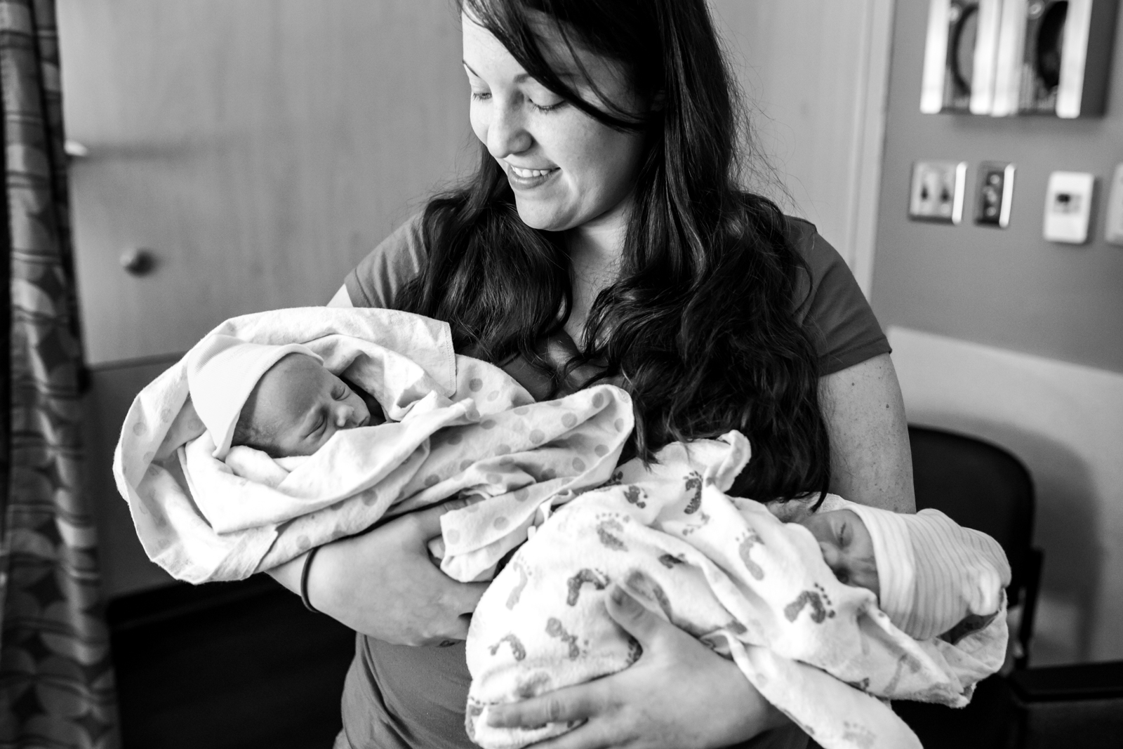 sister holds her twin nieces