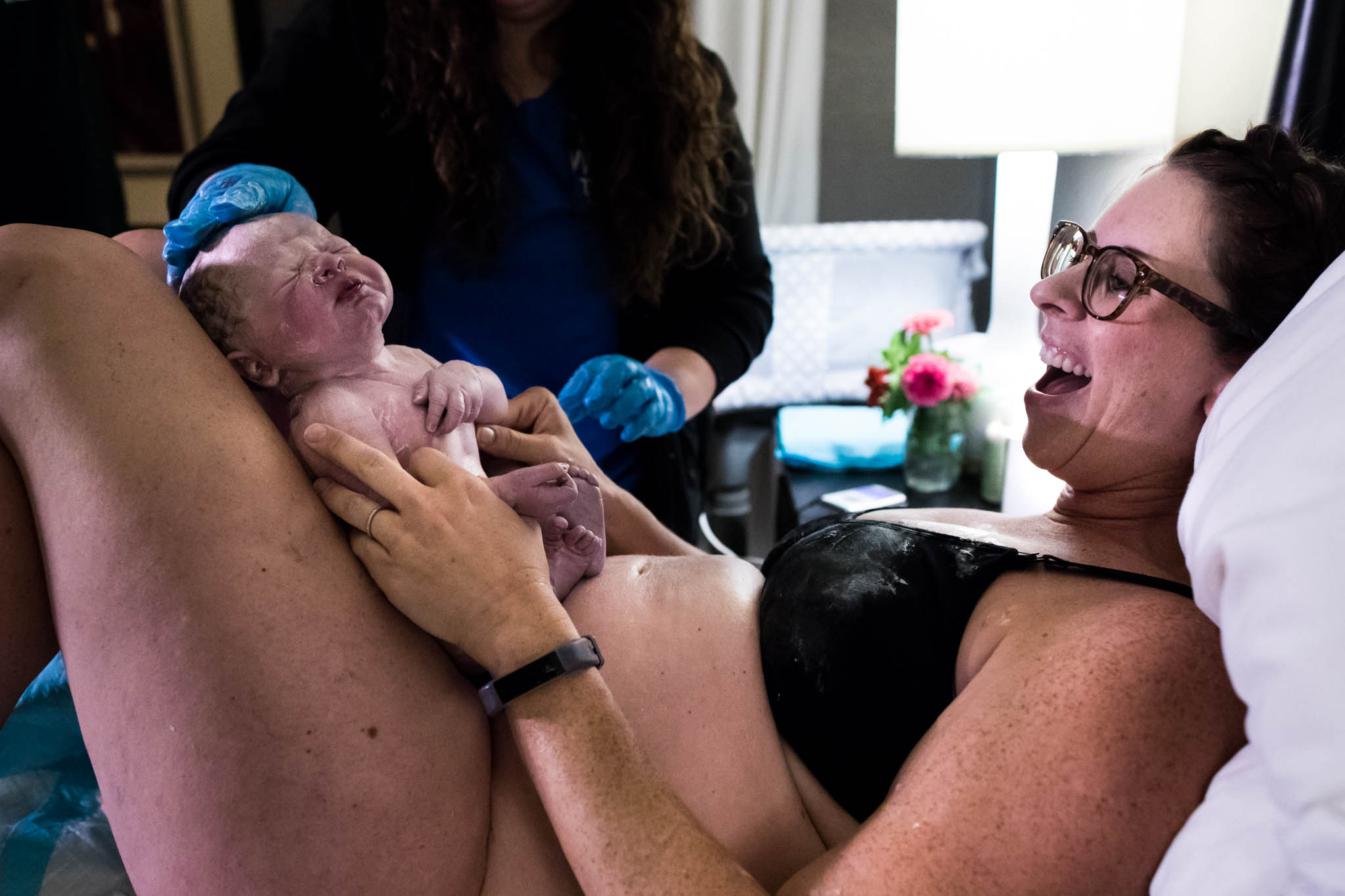Denton Birth Photographer Lawren Rose Photography captures the moment a Mom gets to lay eyes on her new baby boy for the first time