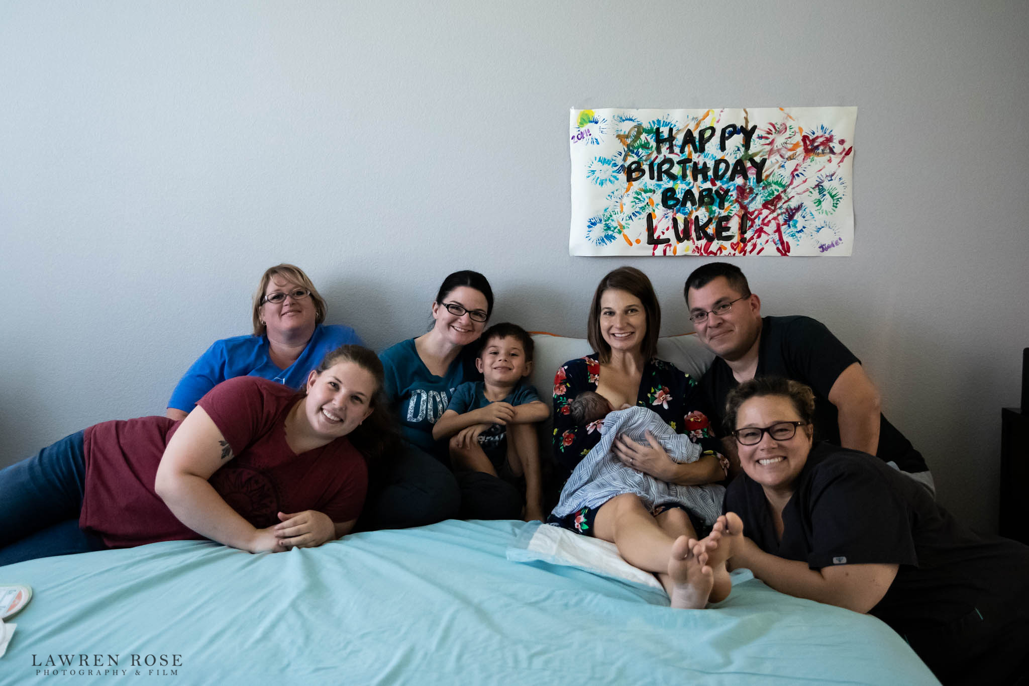 a group photo after a home birth taken by dallas birth photographer Lawren Rose Photography